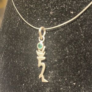 Elegant Silver Pendant with Green Gemstone